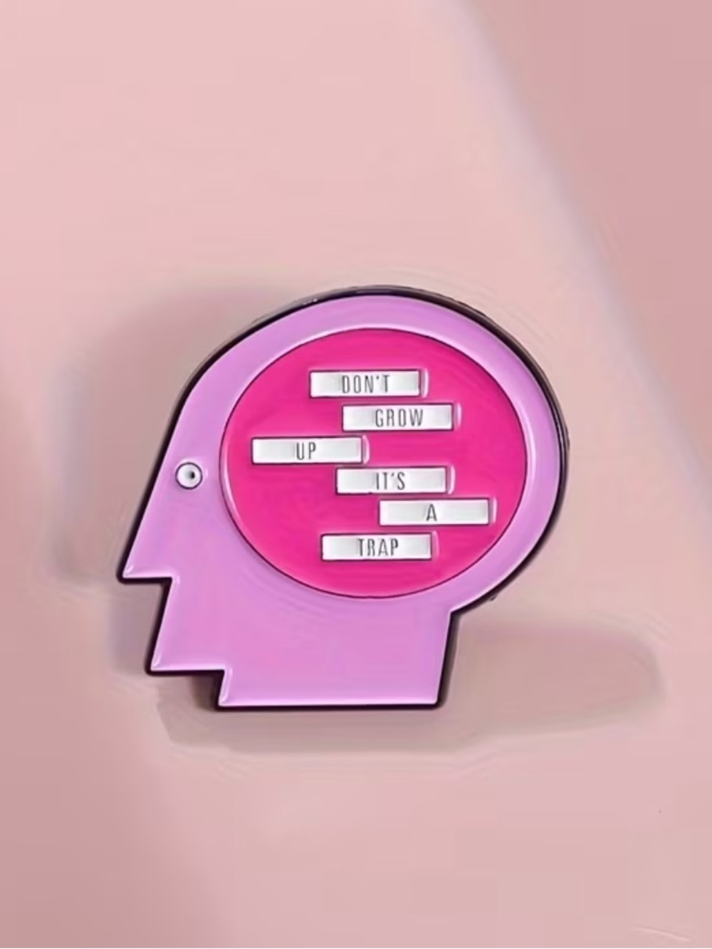 Pink Head-Shaped Enamel Pin - "Don't Grow Up It's A Trap"